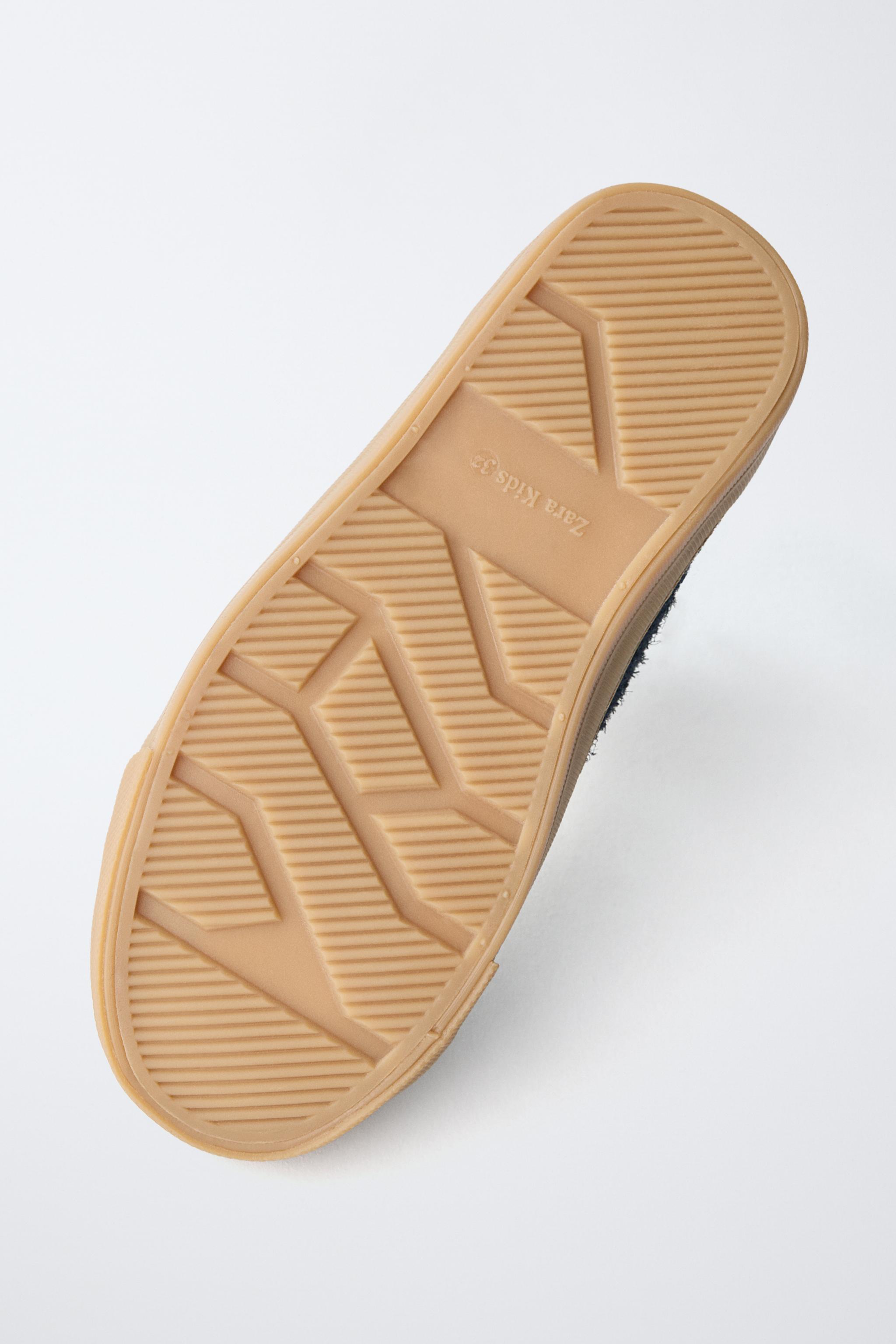 BASKETS MONTANTES EN CUIR