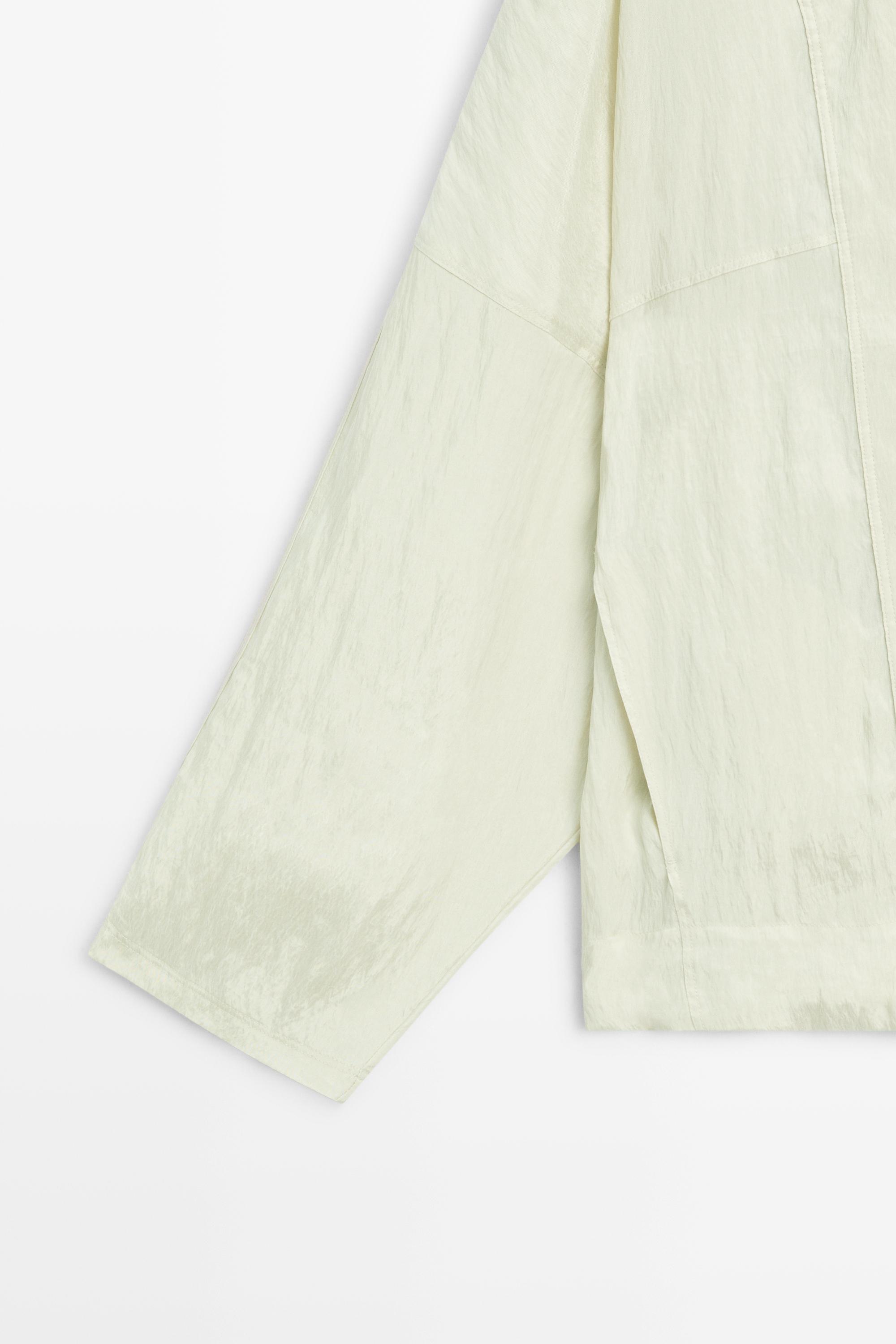 Fluid wrap shirt with button detail