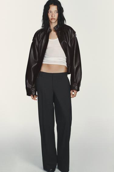 PANTALÓN RAYA DIPLOMÁTICA TIRO BAJO - NEGRO/NARANJA de Zara