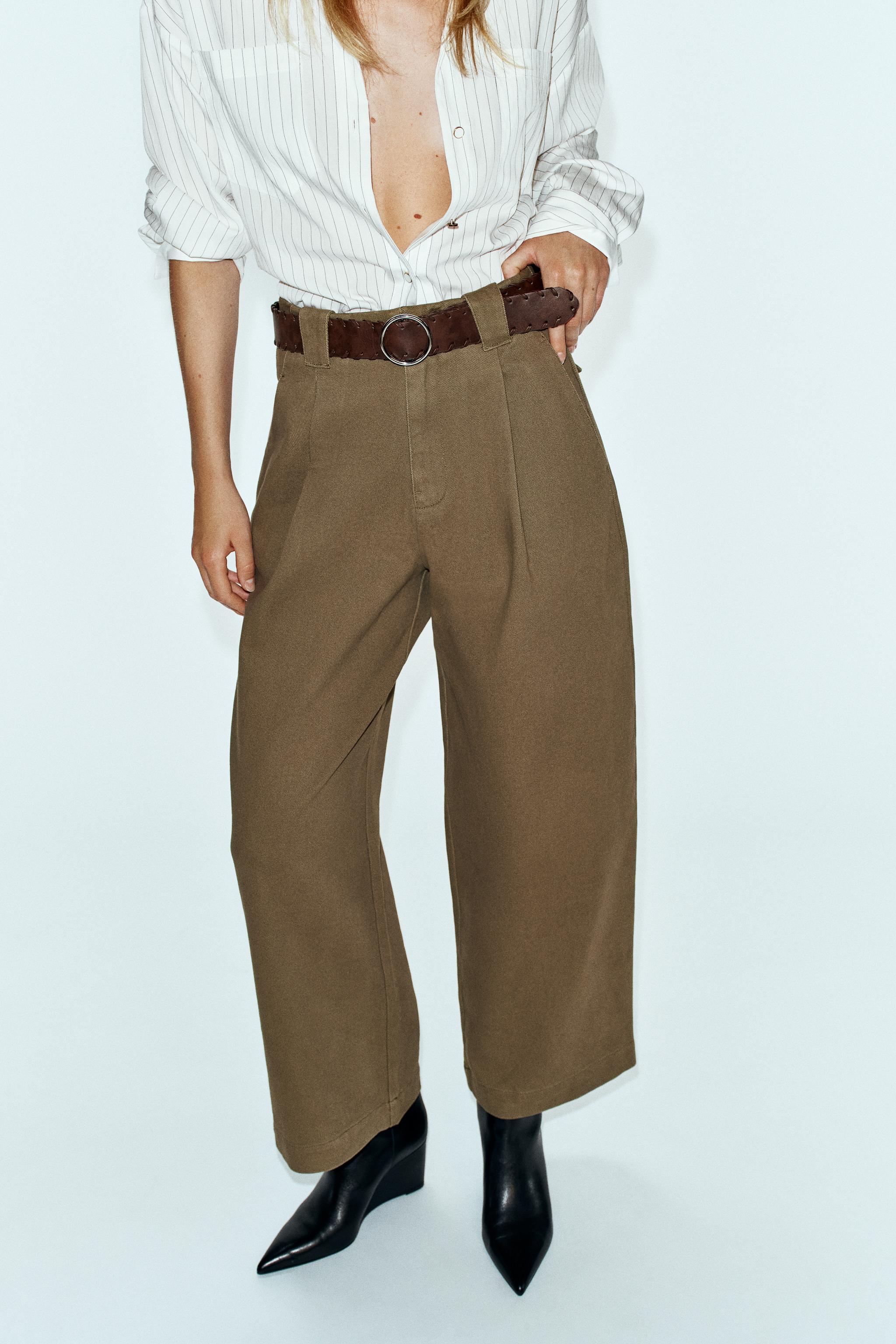 WIDE-LEG PLEATED BELTED PANTS