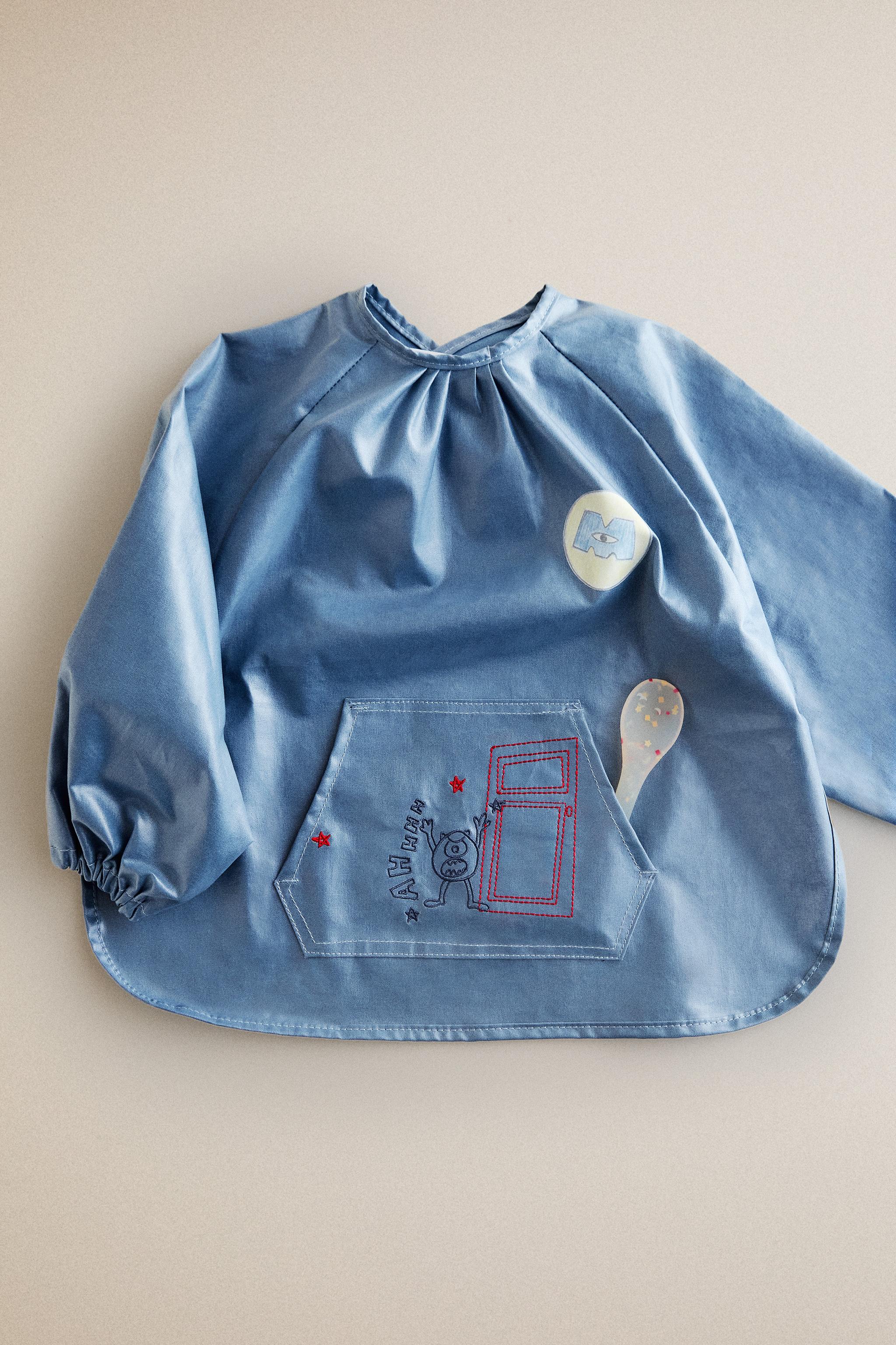 MONSTERS, INC. ©DISNEY/PIXAR KIDS' SLEEVED BIB