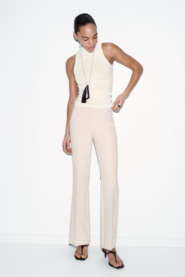 טופ High neck ללא שרוולים - אוף ווייט של Zara