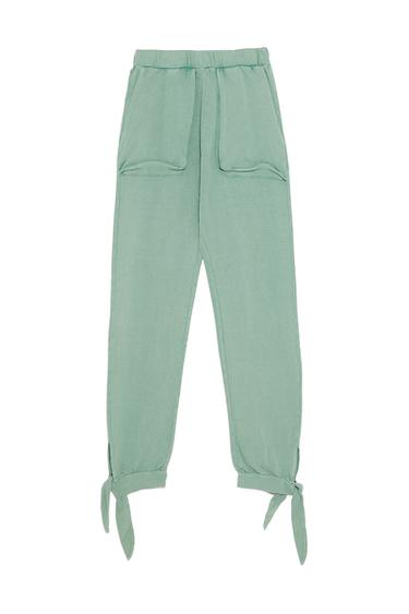 FADED TROUSERS WITH POCKETS