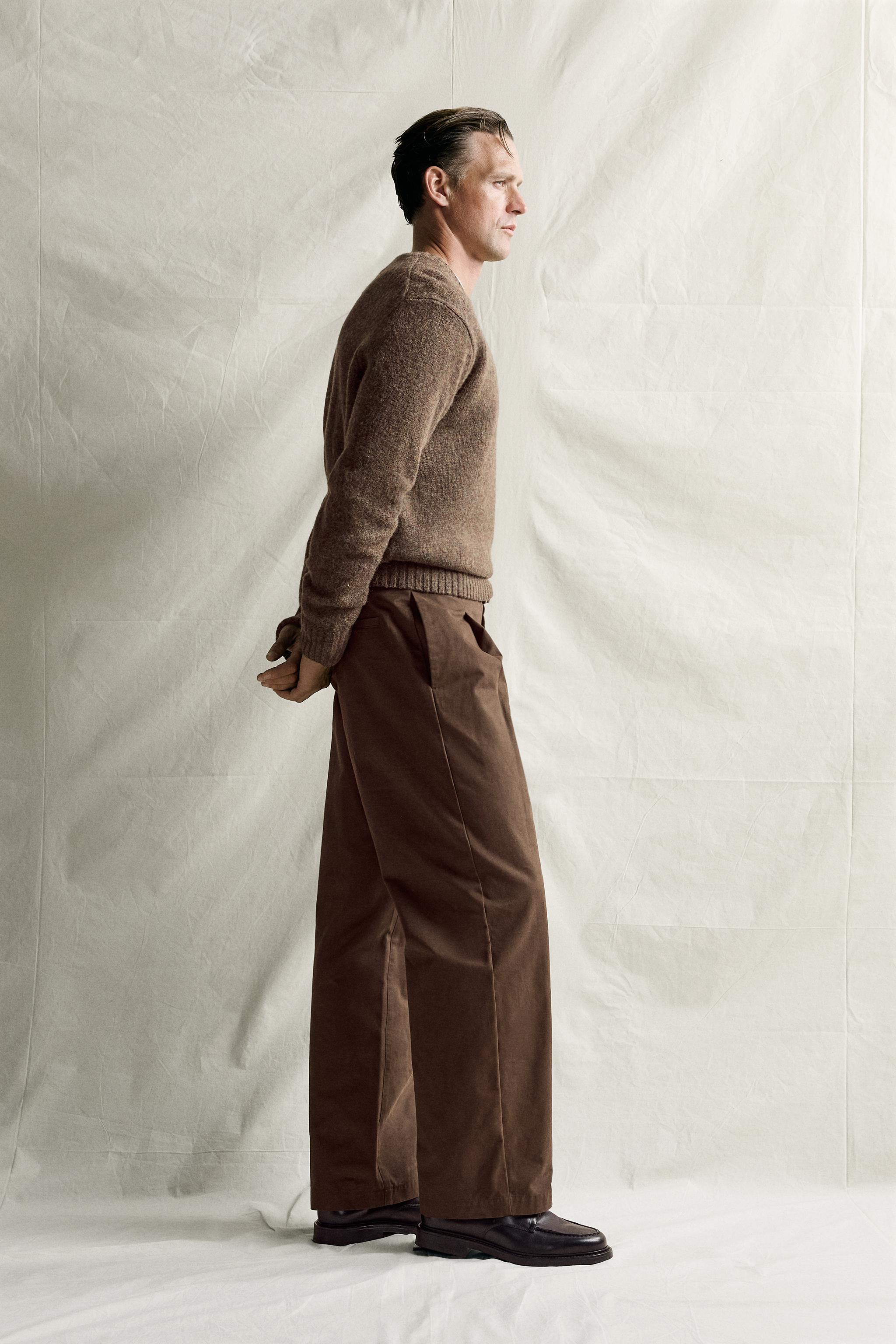 RELAXED FIT PLEATED PANTS