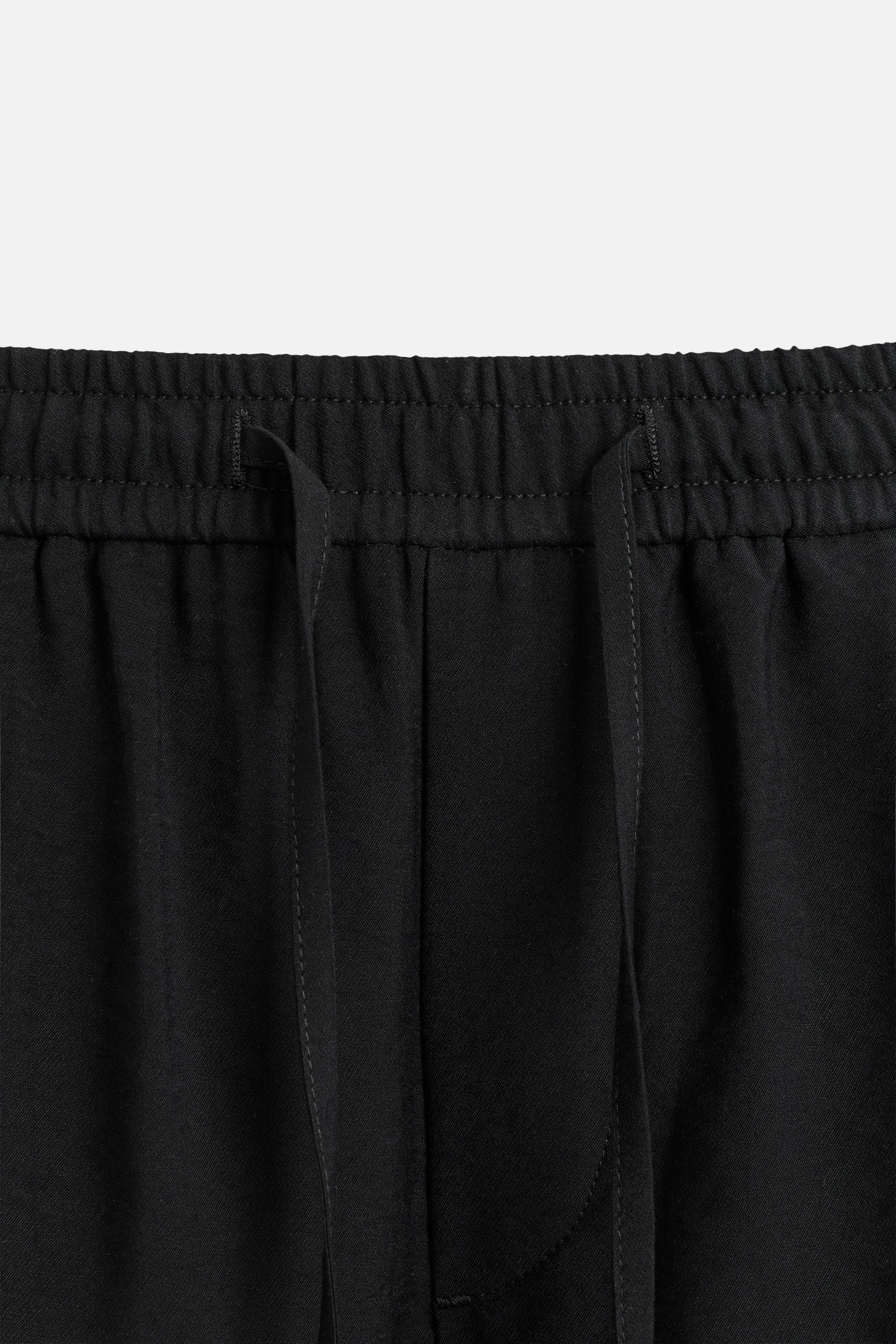 FLOWY RELAXED FIT BERMUDA SHORTS