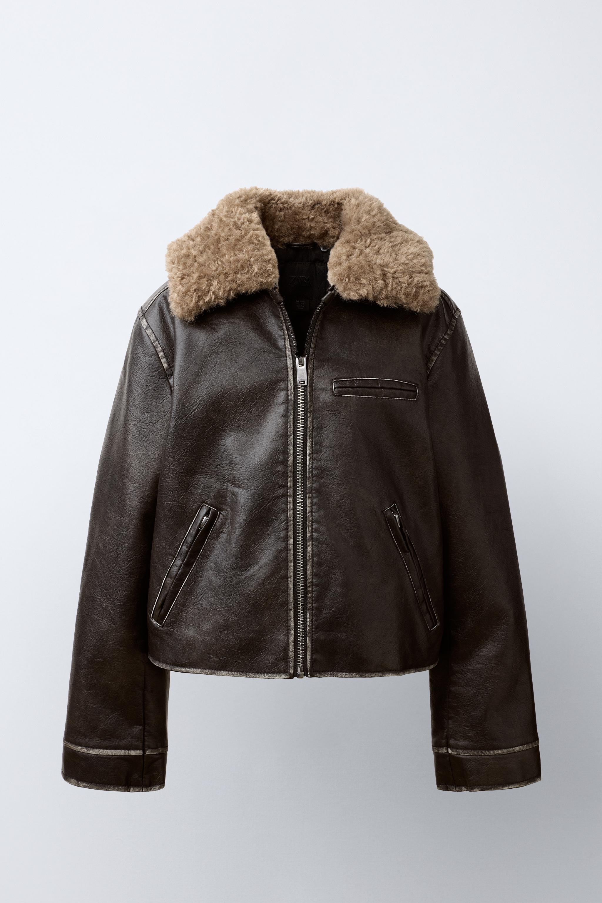 BLOUSON EN MATIÈRE SYNTHÈTIQUE USÉ À COL EFFET FOURRURE