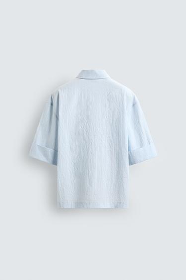 CHEMISE POLO COUPE BOXY TEXTURÉE - Bleu ciel de Zara - Image 7
