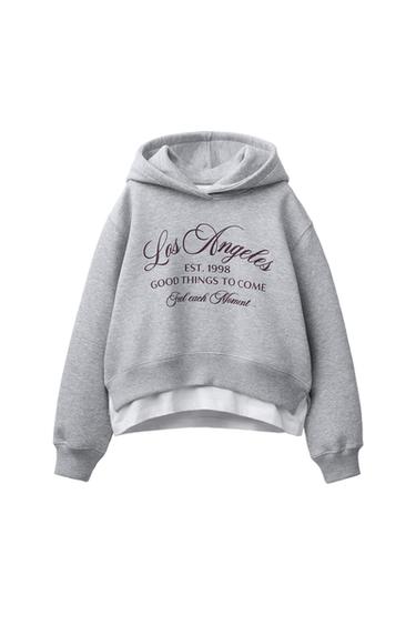 VARSITY DOUBLE HEM HOODED SWEATSHIRT