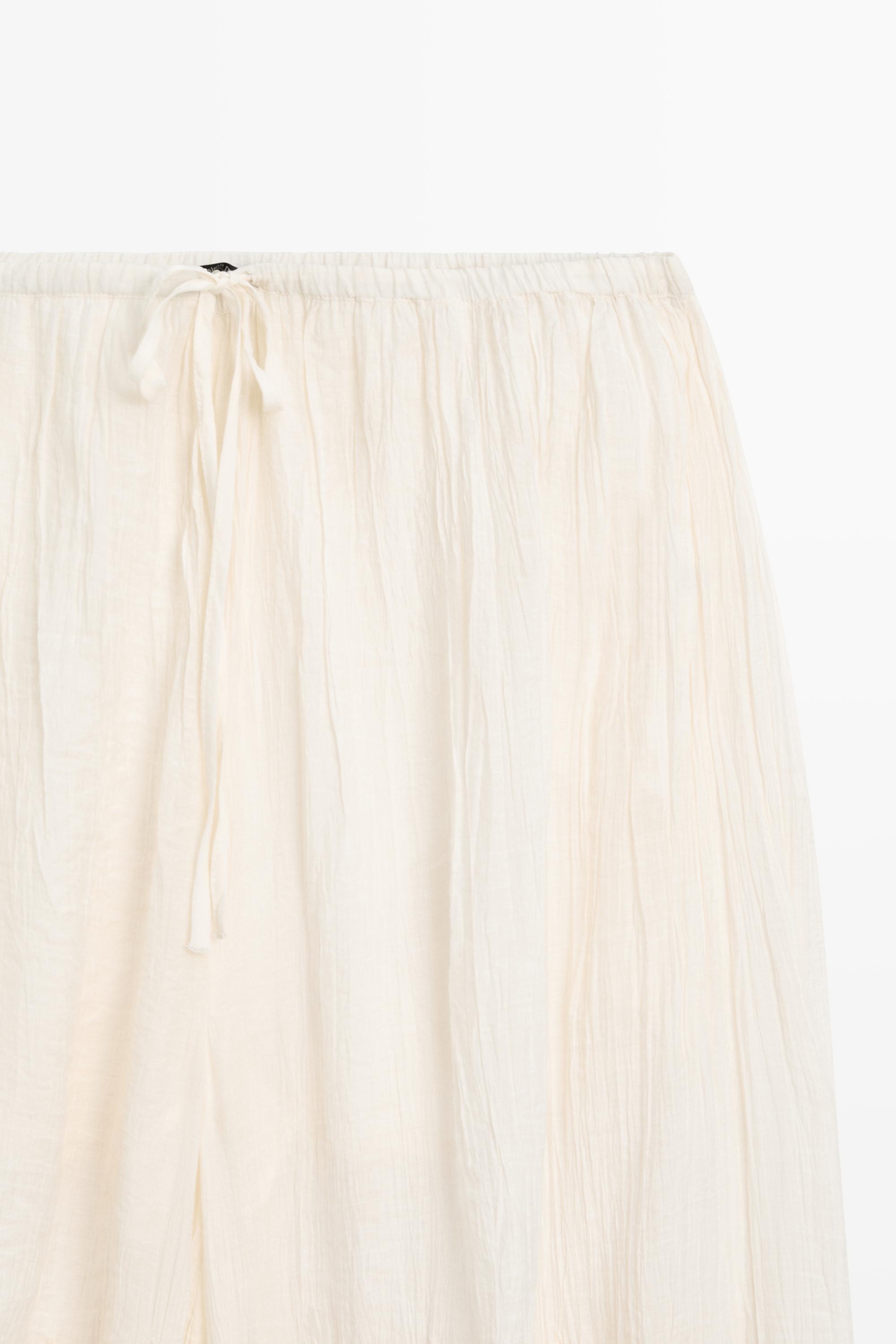 Flowing sarouel trousers with embroidered detail