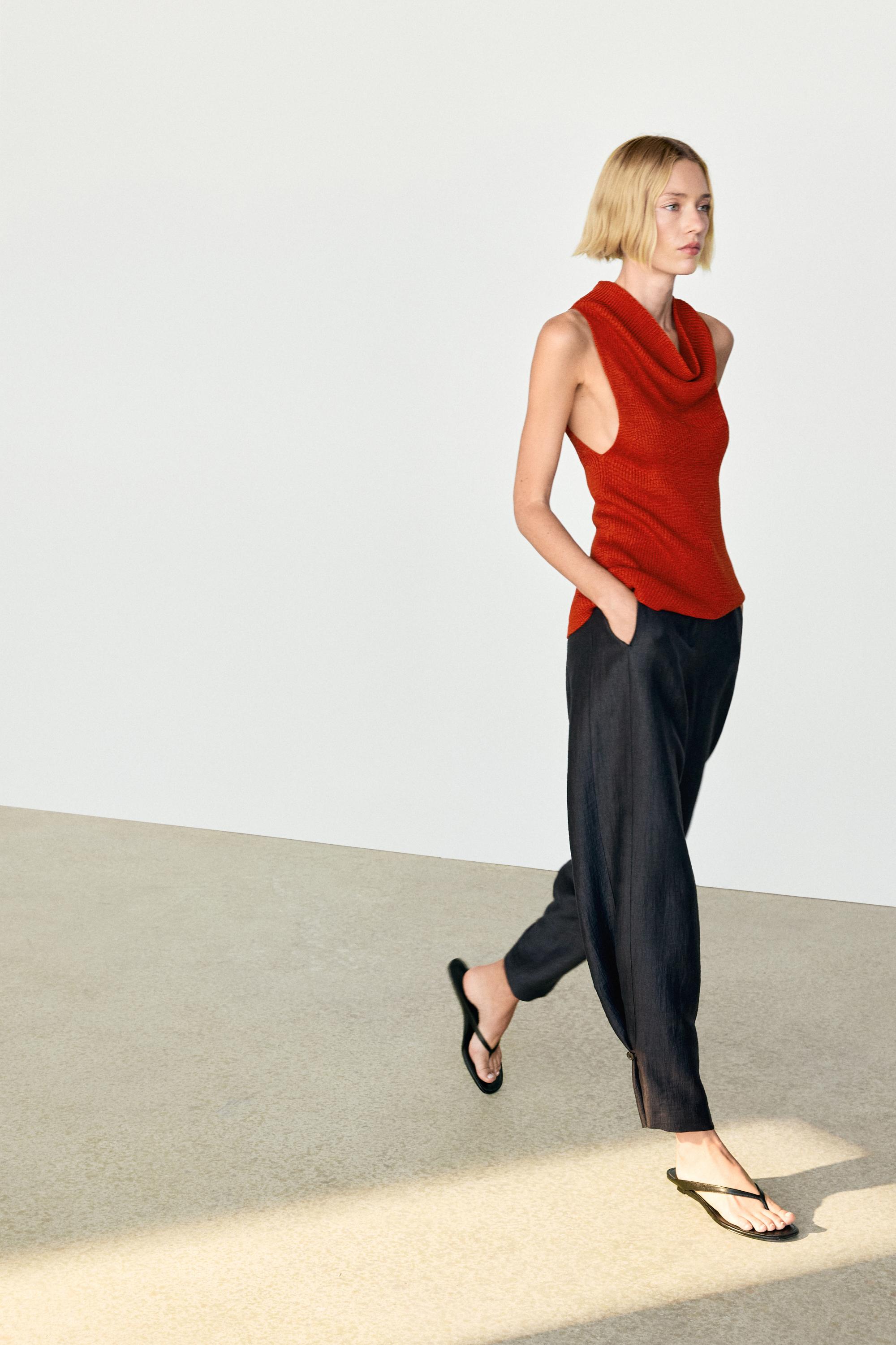 Trousers with gathered hems