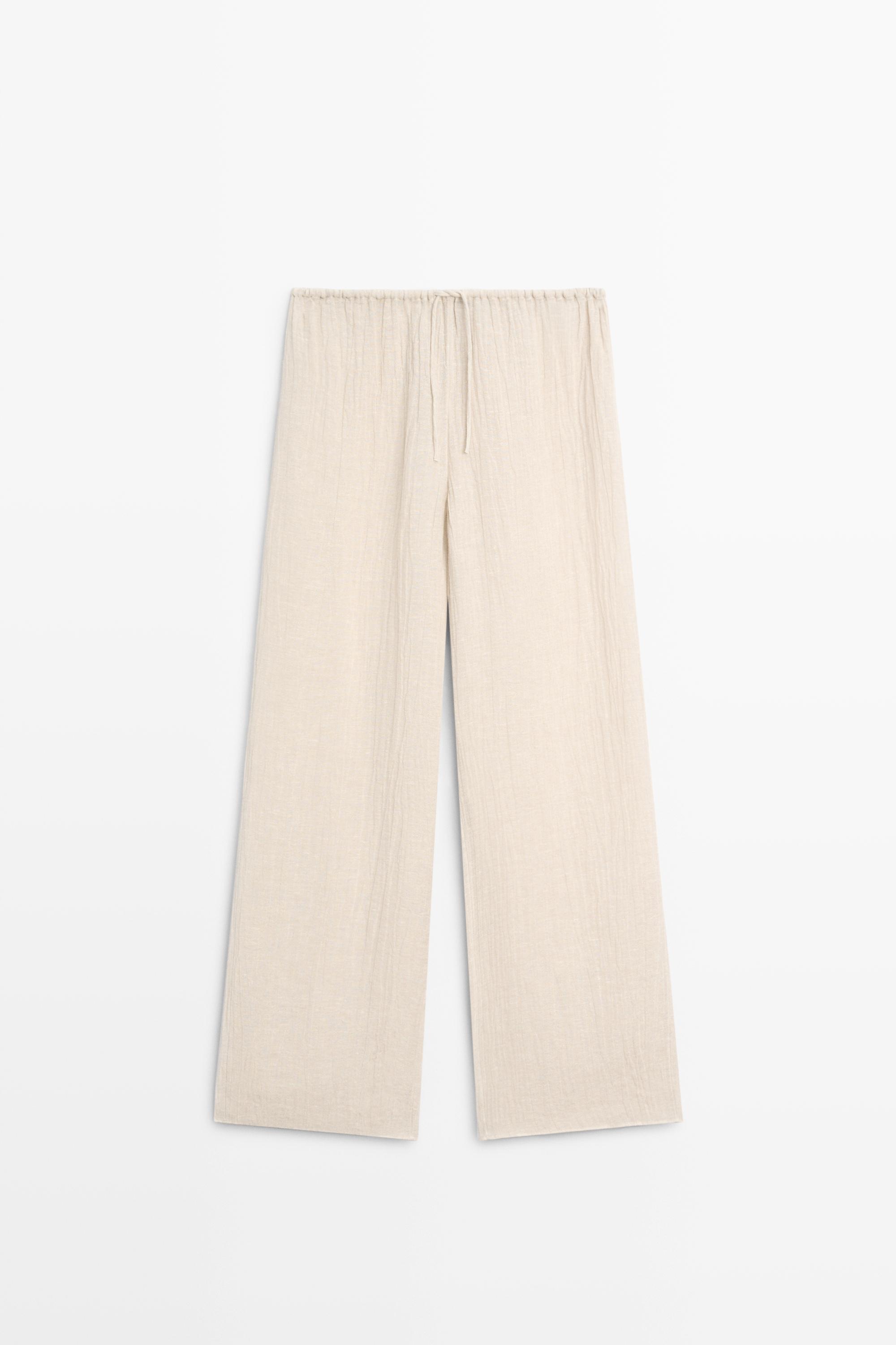 Total look flowing waffle-knit linen blend trousers — Beige marl
