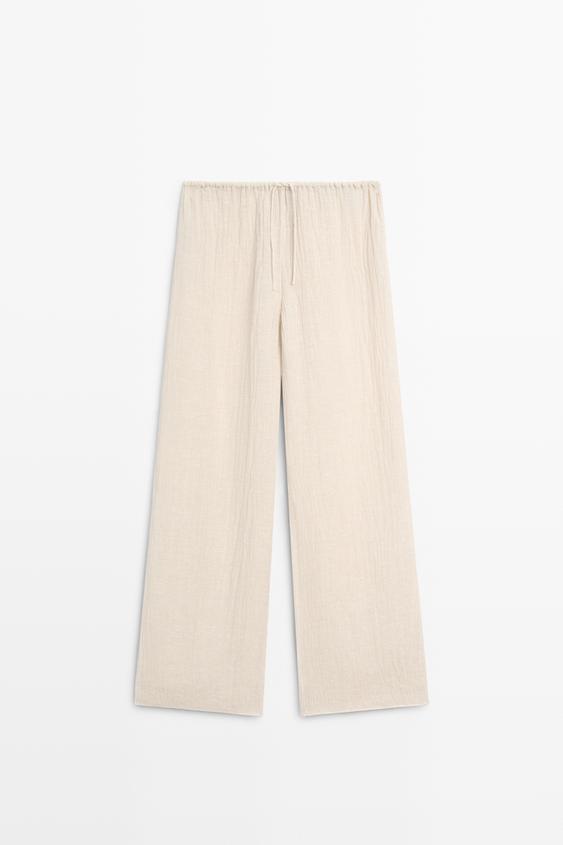 Total look flowing waffle-knit linen blend trousers from Zara - $180