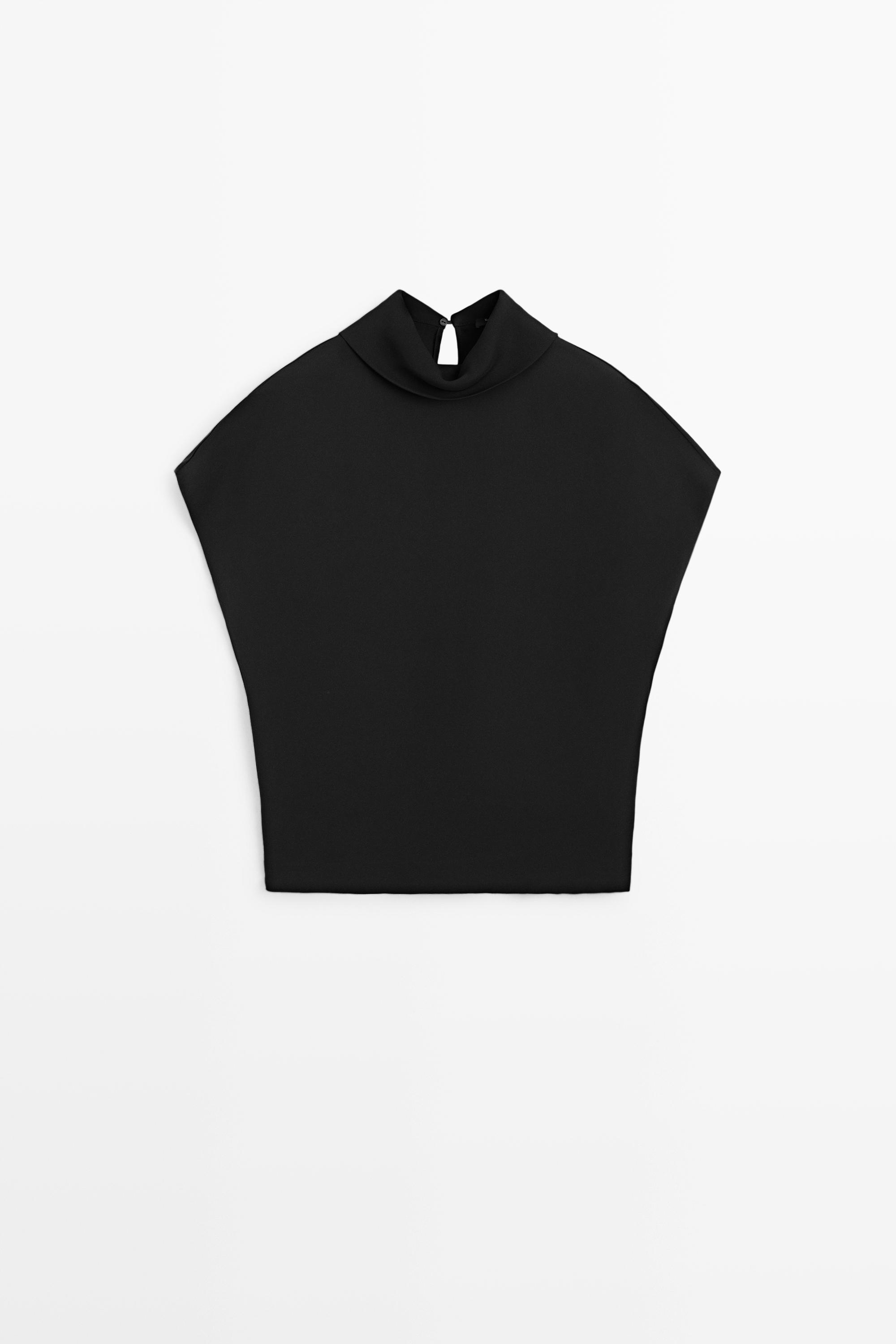Top col roulé emmanchures larges