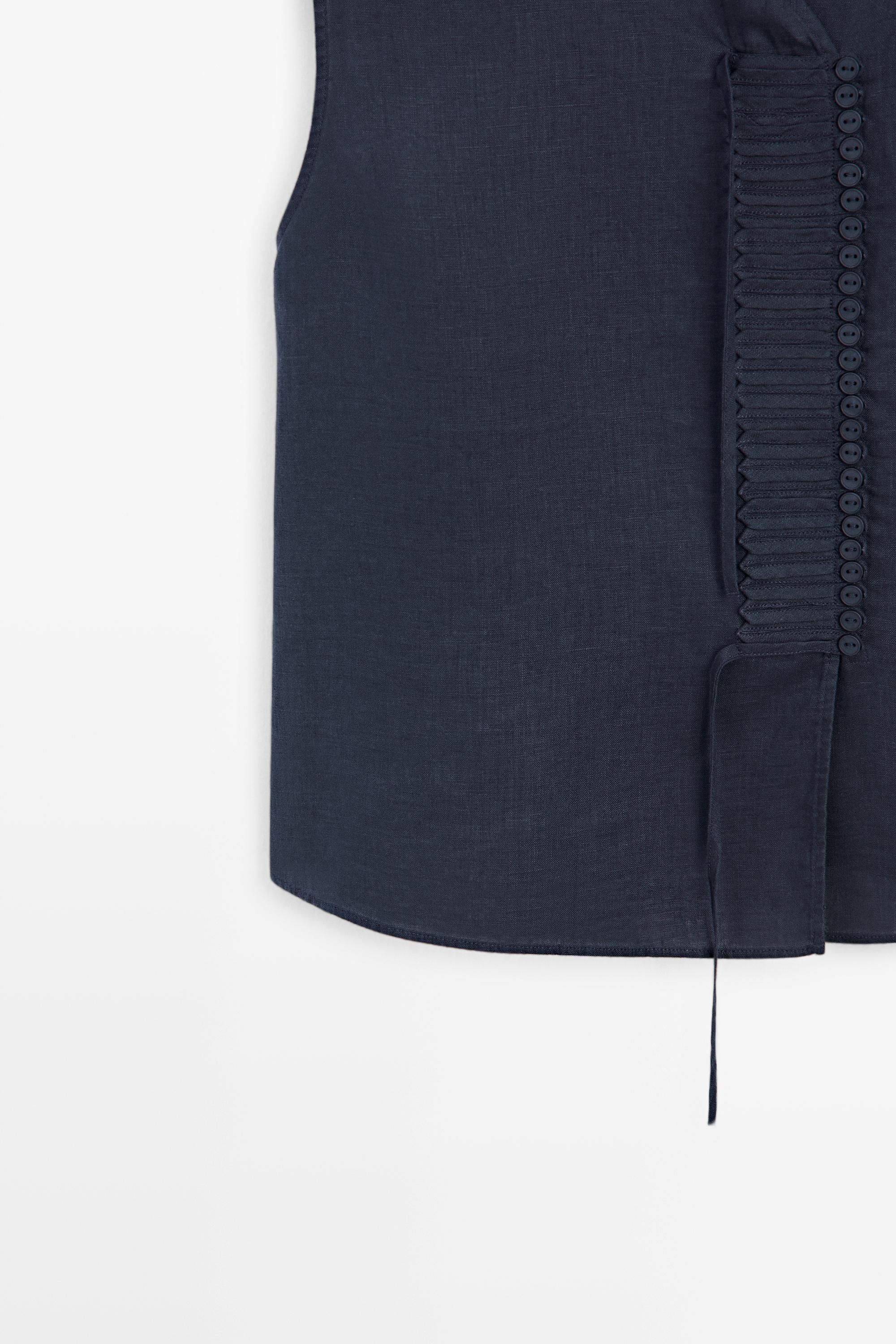 100% linen crossover top with button detail
