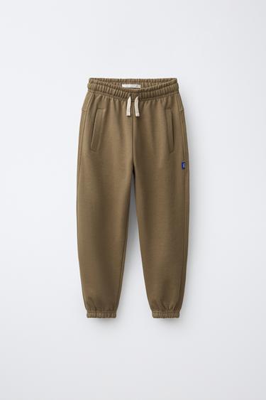 PANTALONS JOGGER DE PELFA LLISOS AMB ETIQUETA - terrós de Zara