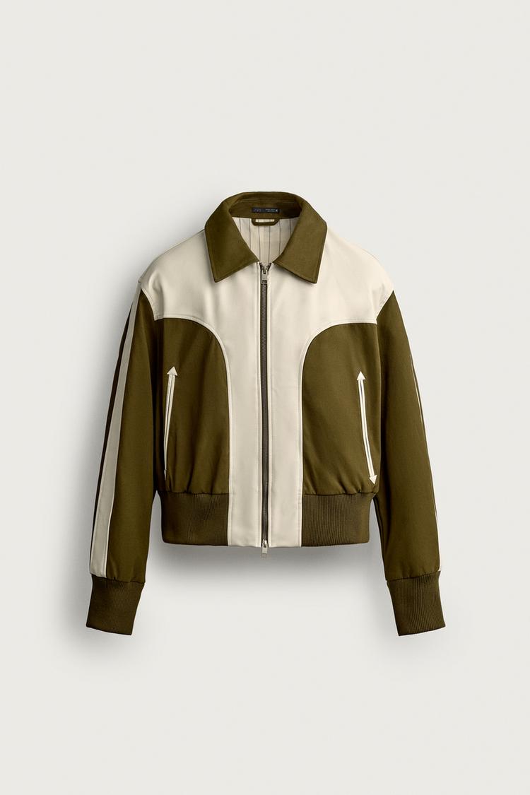 CONTRASTING LEATHER EFFECT JACKET