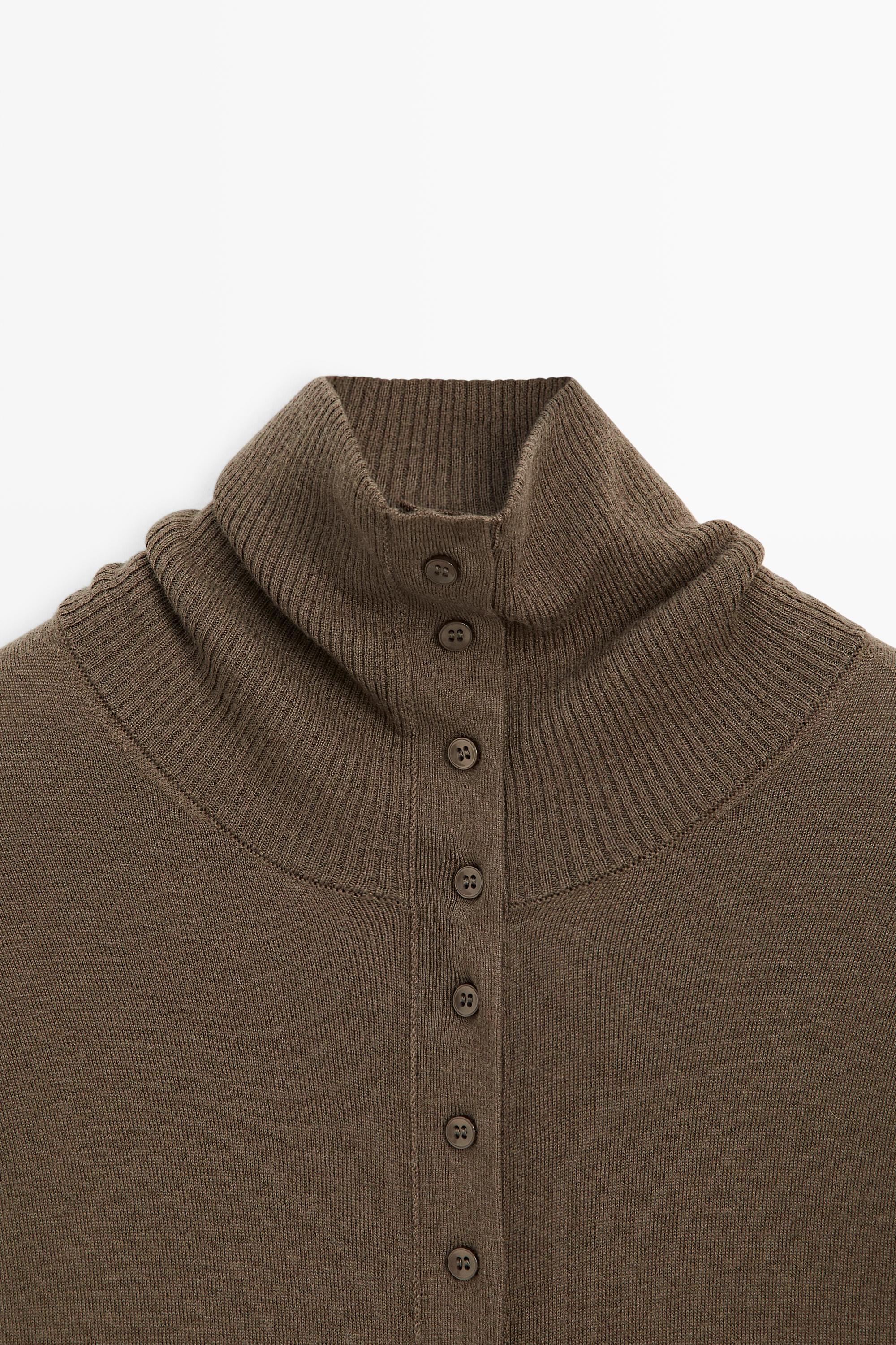 Turtleneck cardigan with button detail