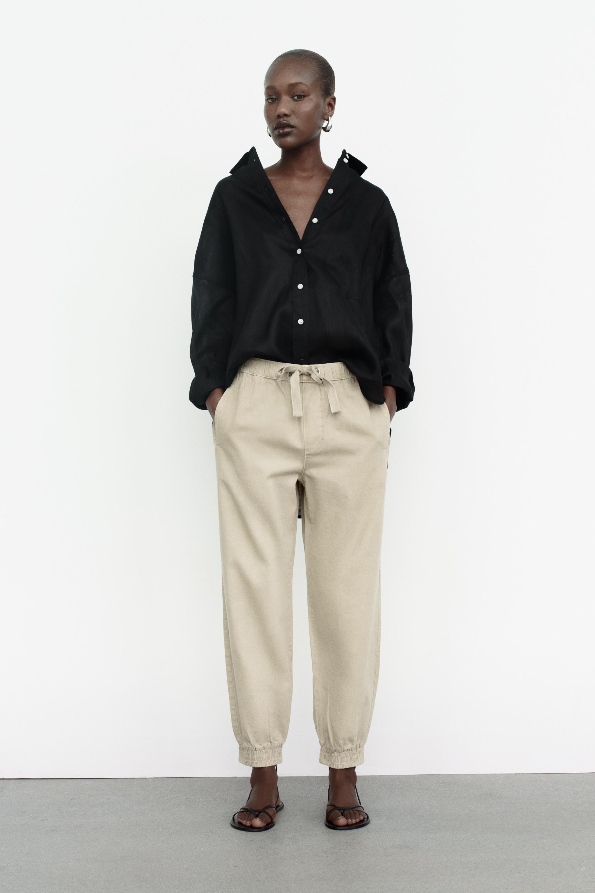 JOGGER TROUSERS WITH CUFFED HEMS - Sand | ZARA Spain