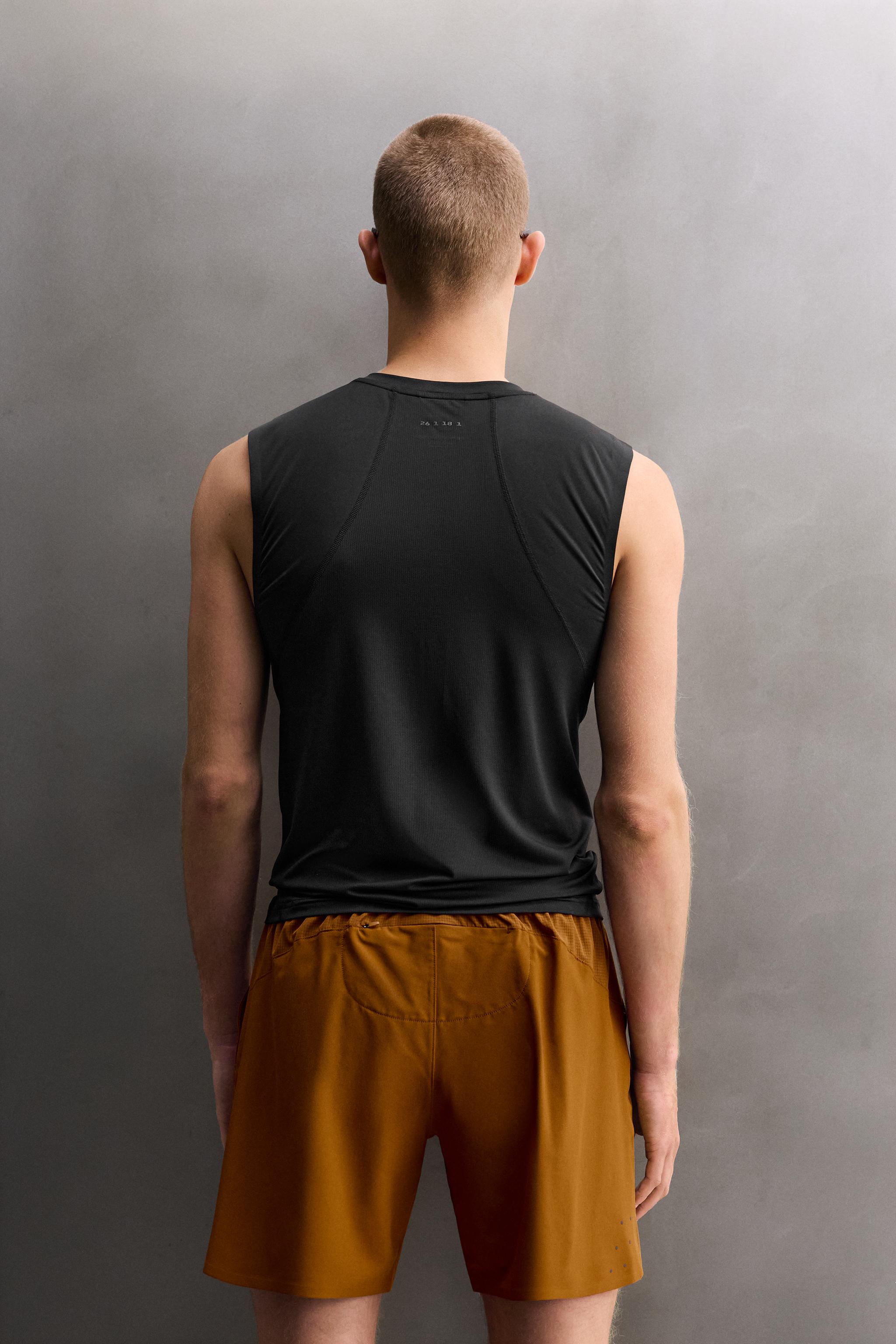 FIRST LAYER TANK TOP