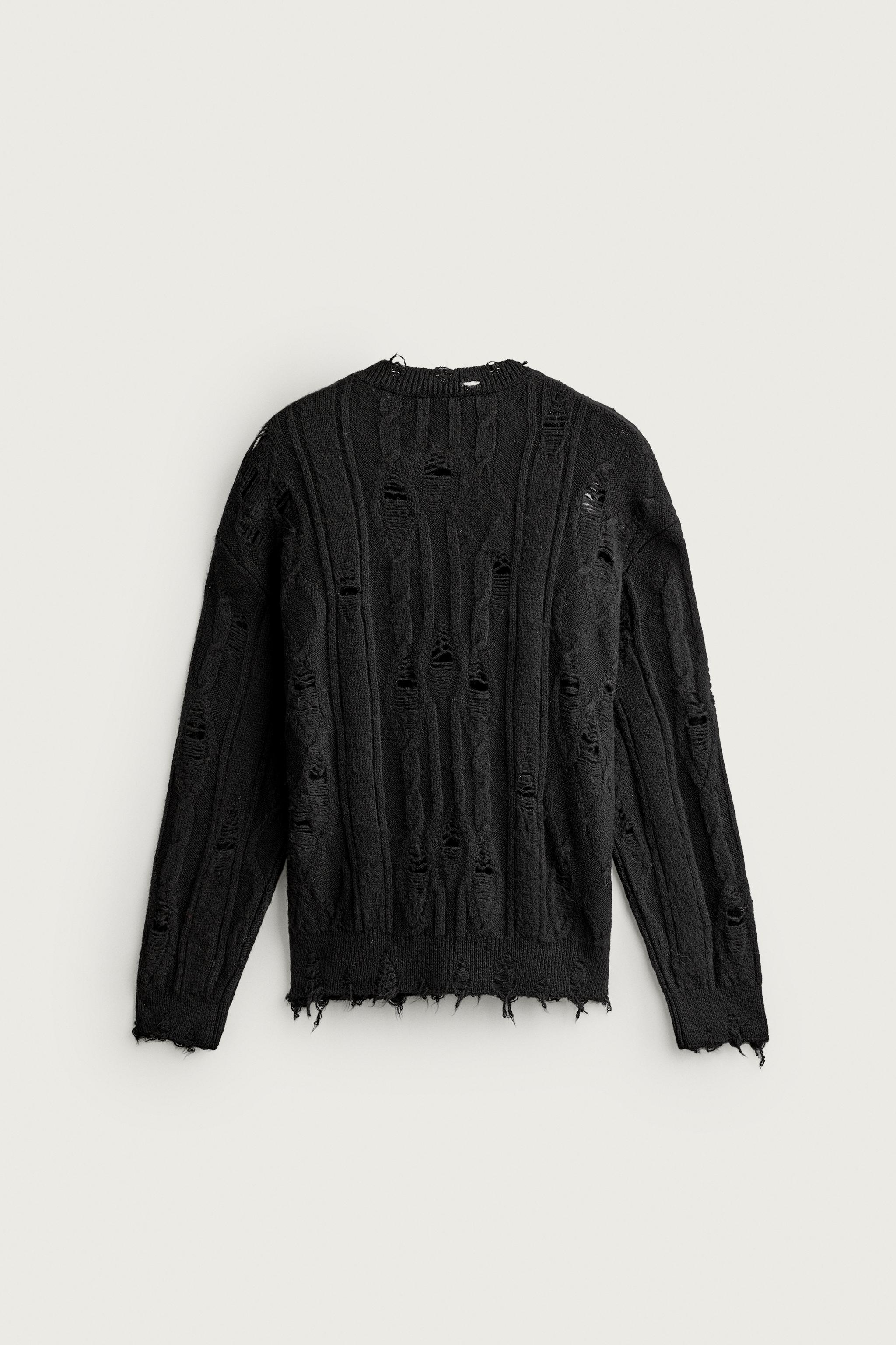 PULL TORSADES AJOURÉ