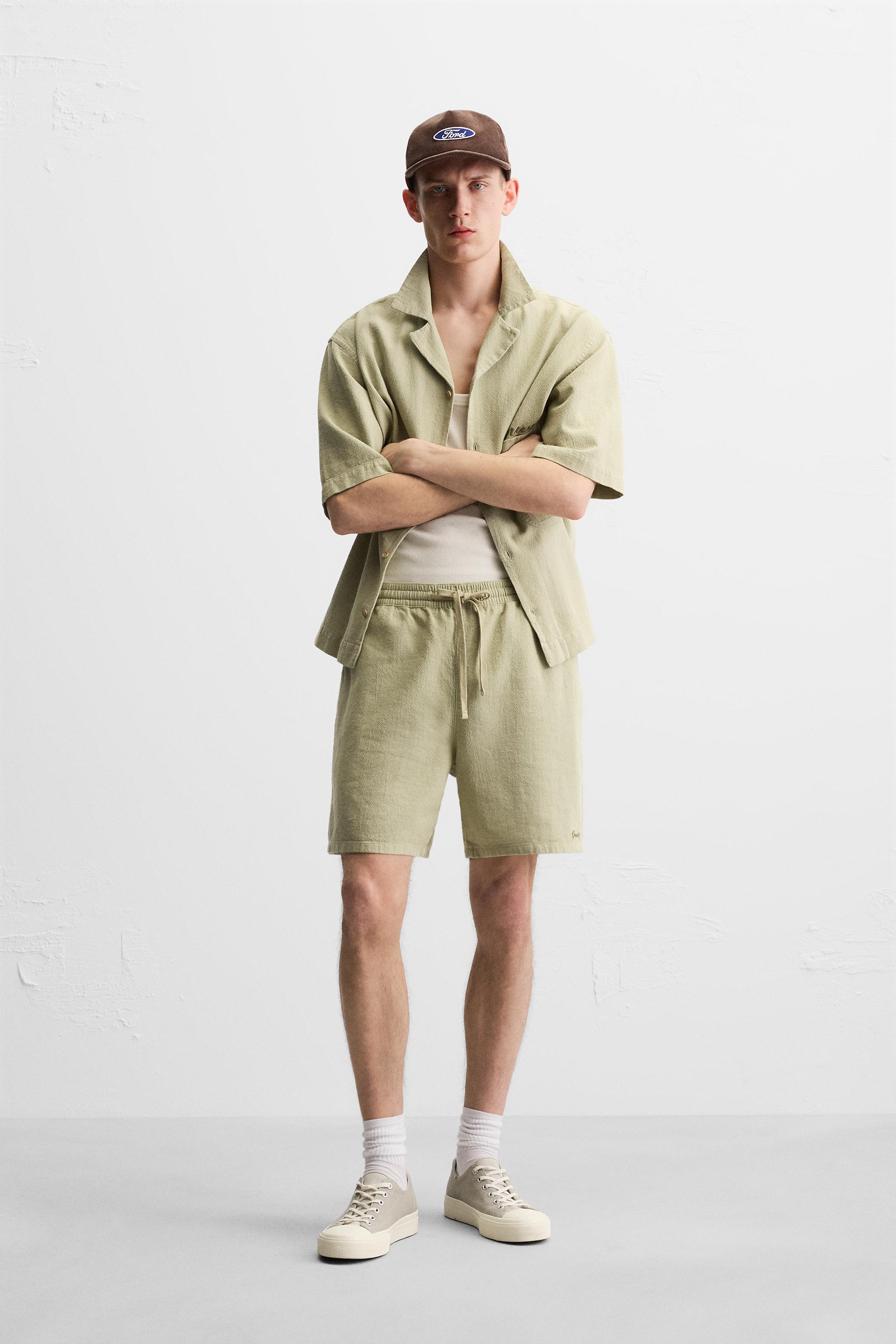 TEXTURED EMBROIDERED SHORTS