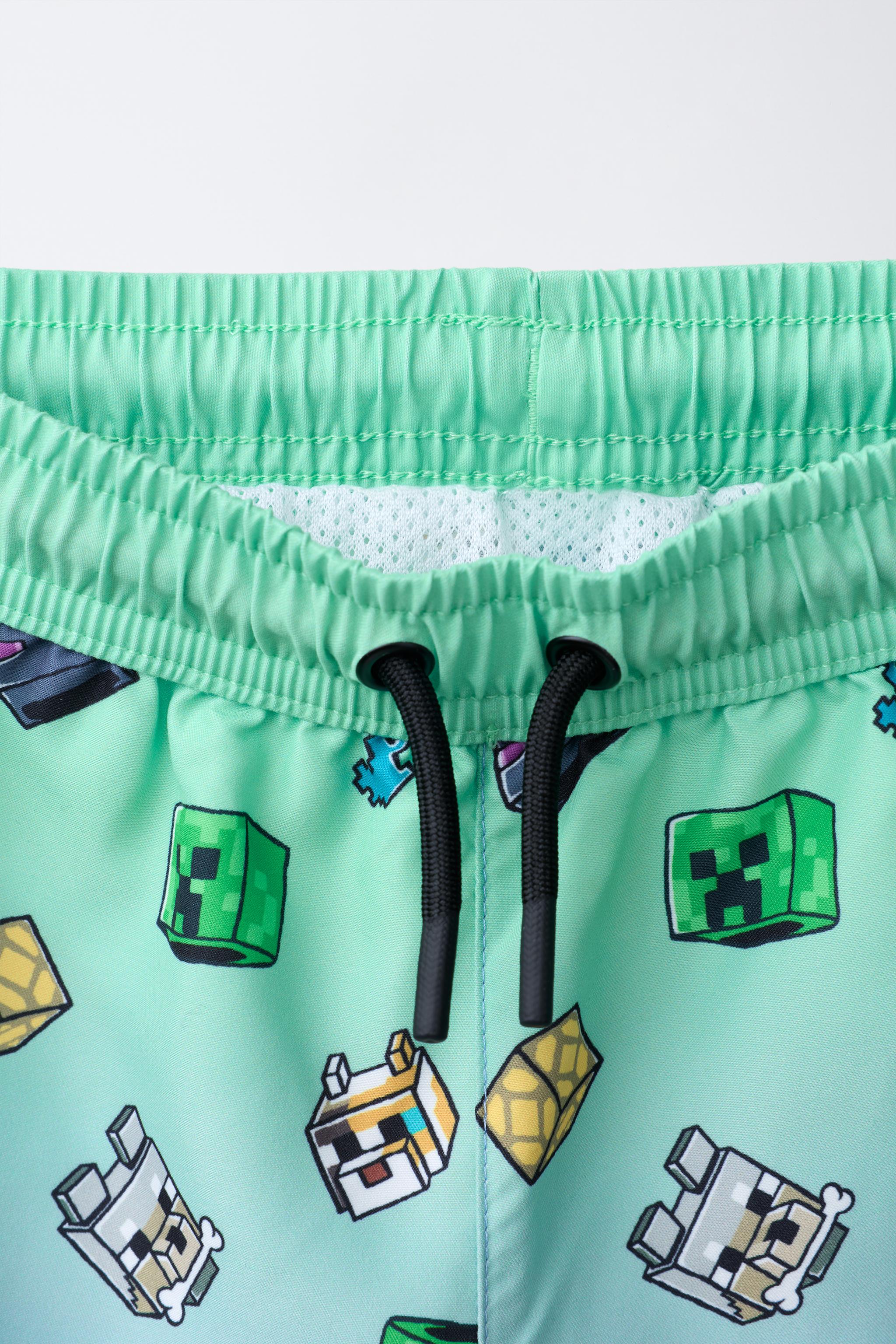 MINECRAFT © MOJANG AB. ™ SWIM SHORTS