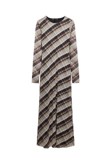 Front view of a long, checked dress with long sleeves and a round neck.