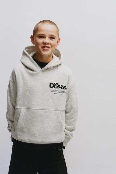 Zaras SWEATSHIRT MED HUVA OCH KRUSAD TEXT - Gråmelerad grå