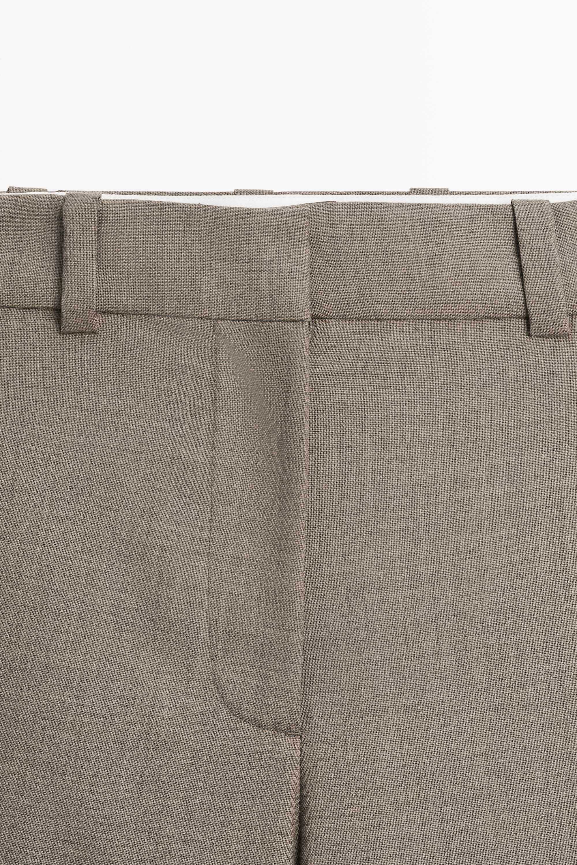 100% wool darted pants with buttoned hem detail