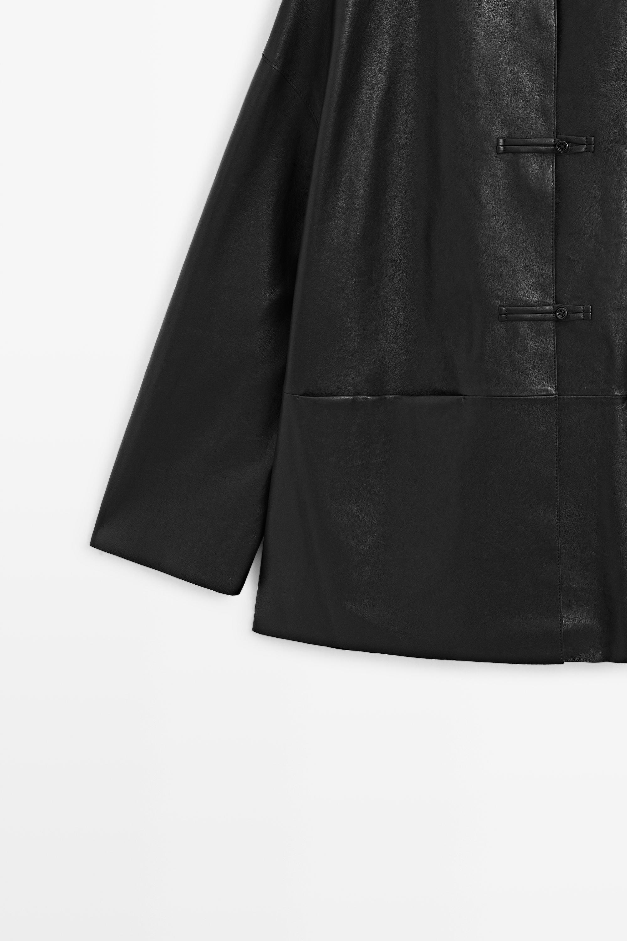 Leather jacket with toggle detail