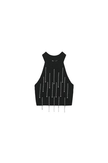 LIMITLESS CONTOUR COLLECTION<br/><br/>Fitted top with high collar and long sleeves.