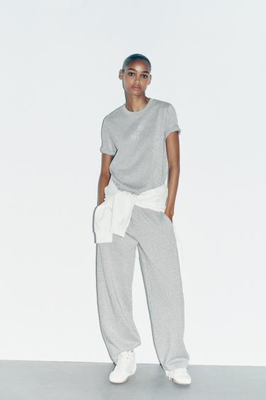 T-SHIRT WITH METALLIC THREAD SLOGAN - Grey marl by Zara