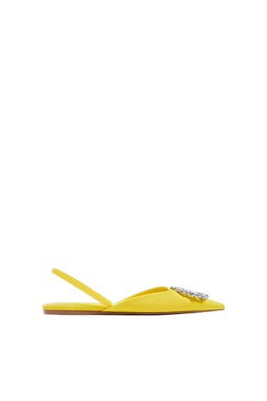 FLAT MULES WITH RHINESTONE DETAIL