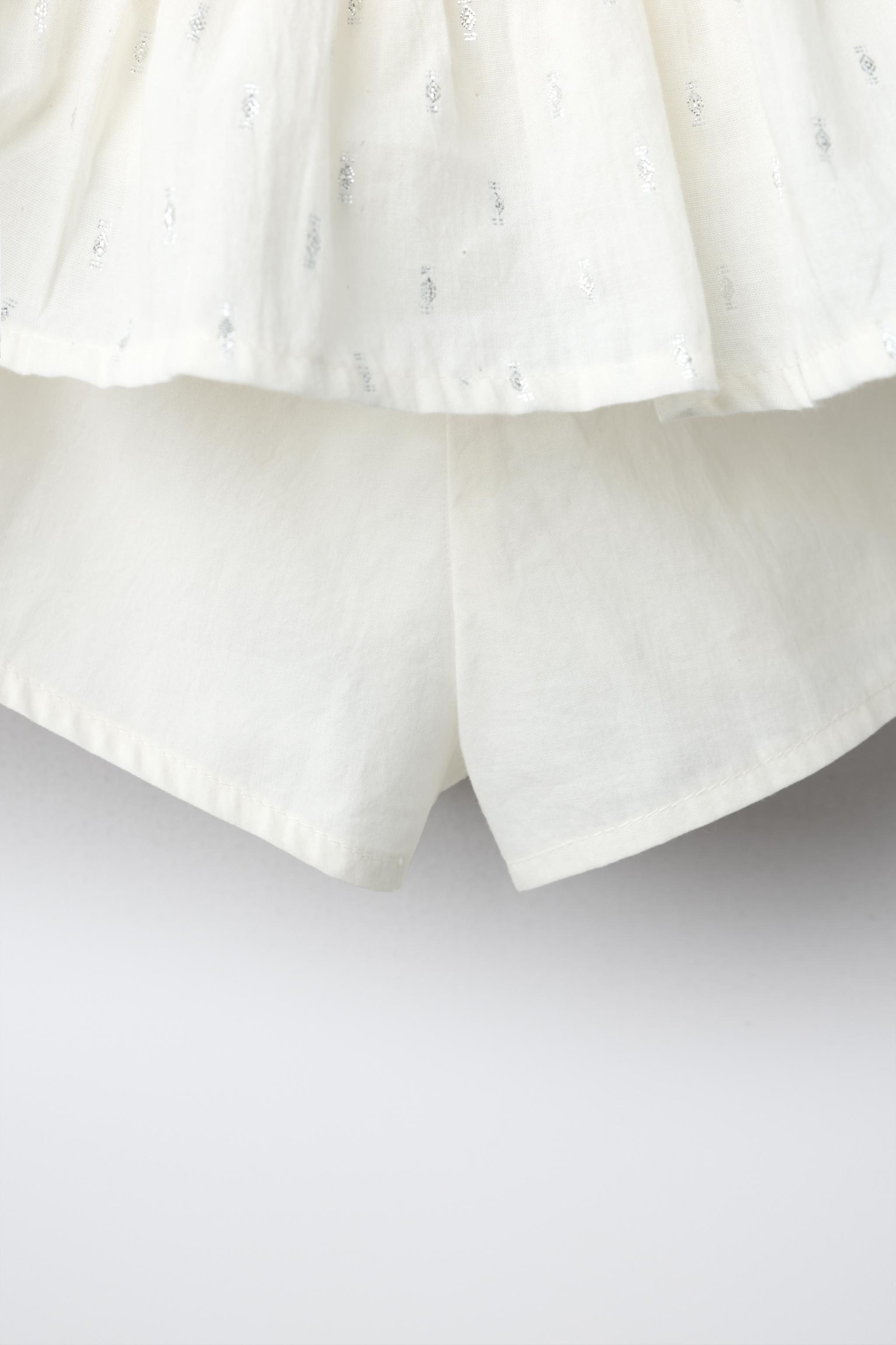 SHINY RUFFLE SKIRT