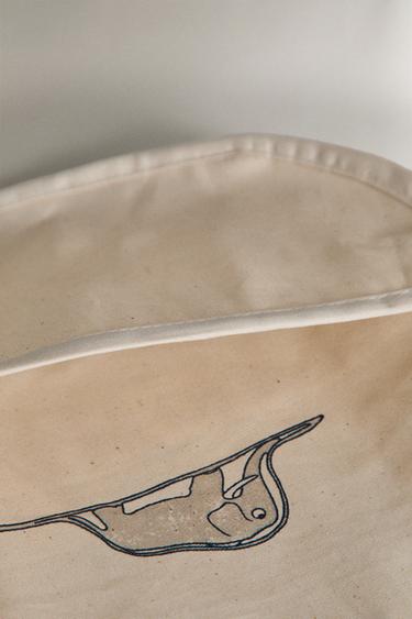 LE PETIT PRINCE CHILDREN'S RESIN-COATED BIB - Cream by Zara - Image 4