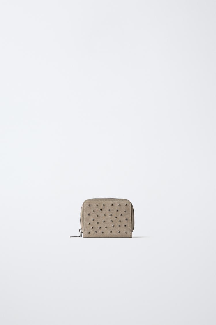 CARTERA TACHAS PIEL