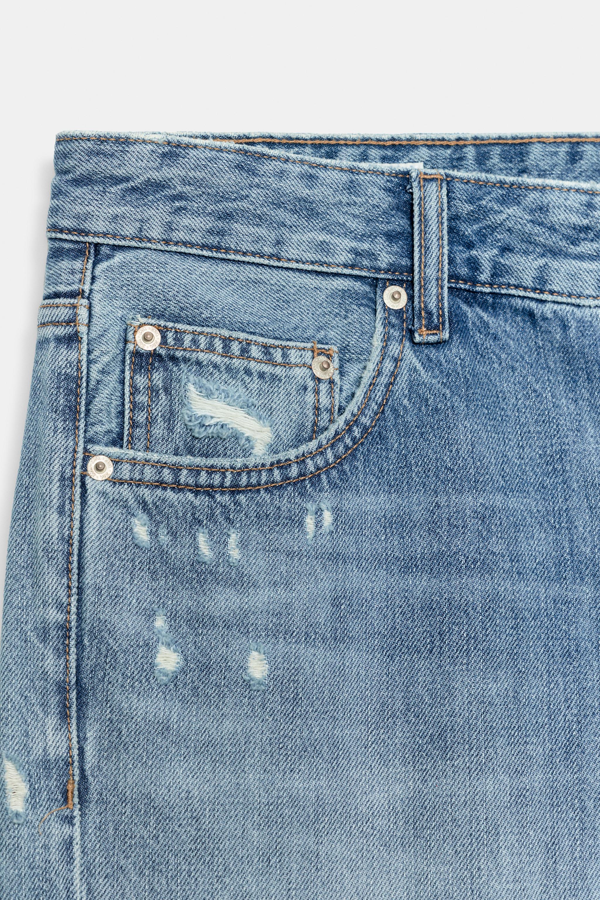 JEAN TRF WIDE LEG FLARE TAILLE BASSE DÉCHIRÉ