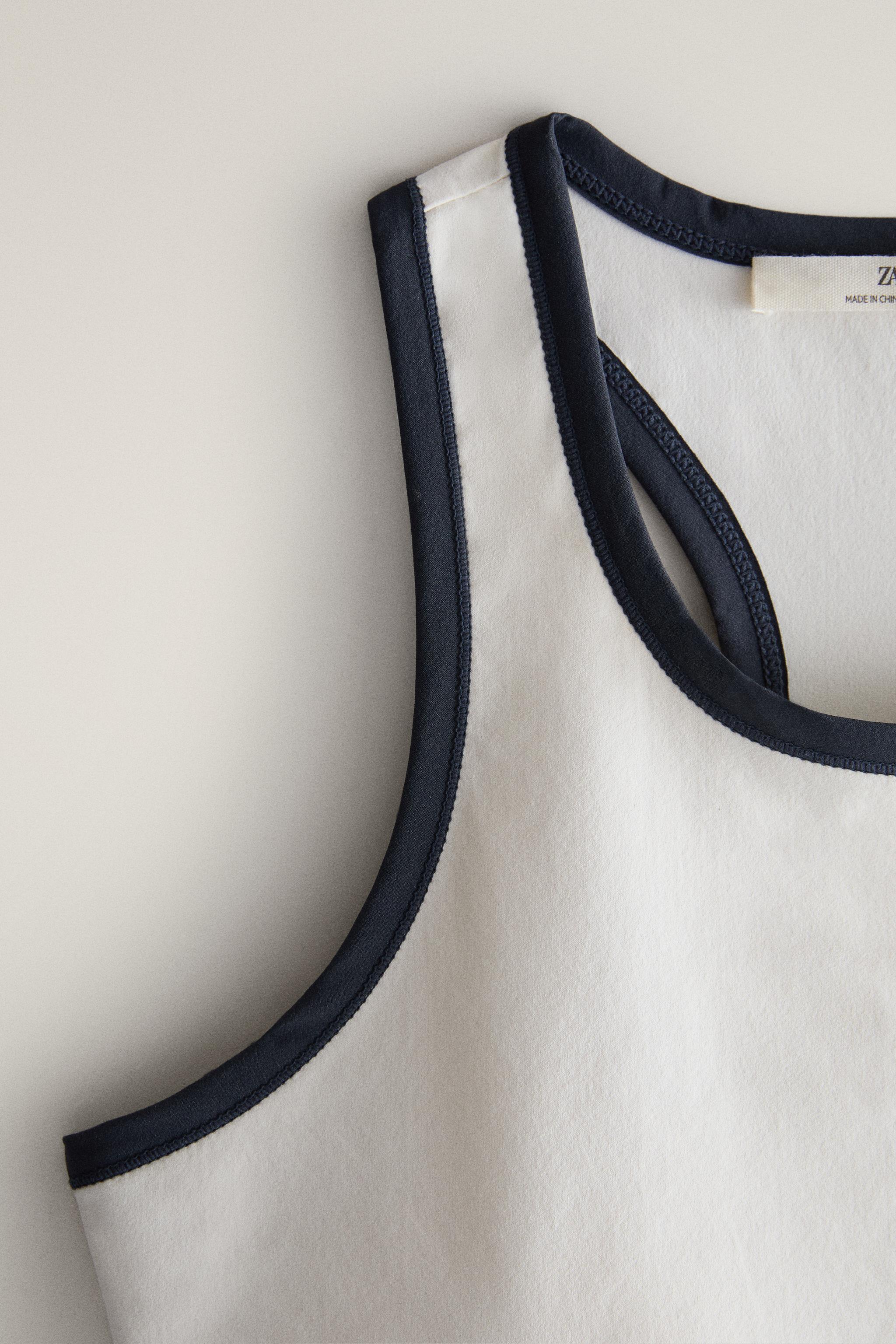 CONTRAST PIPING SPORTS TOP