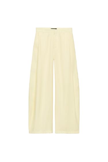 FLOWING PLEATED TROUSERS - Light yellow by Zara