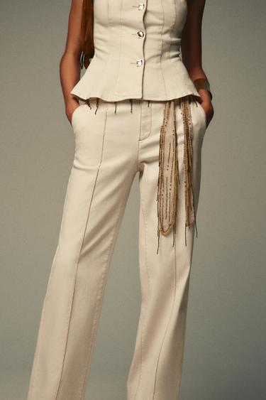 PANTALON BOOTCUT SURPIQÛRES - Écru de Zara - Image 1