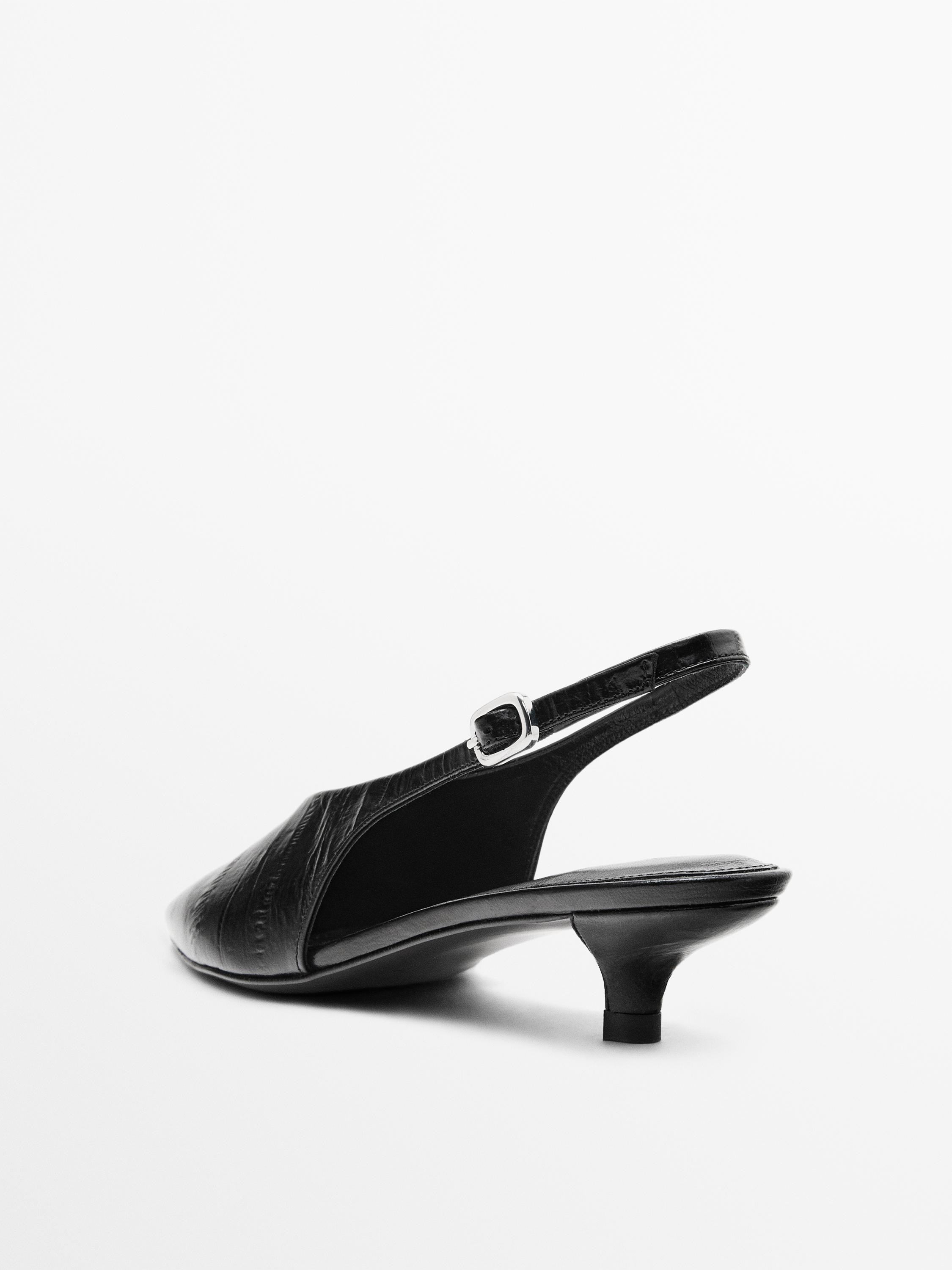 High-heel slingback shoes