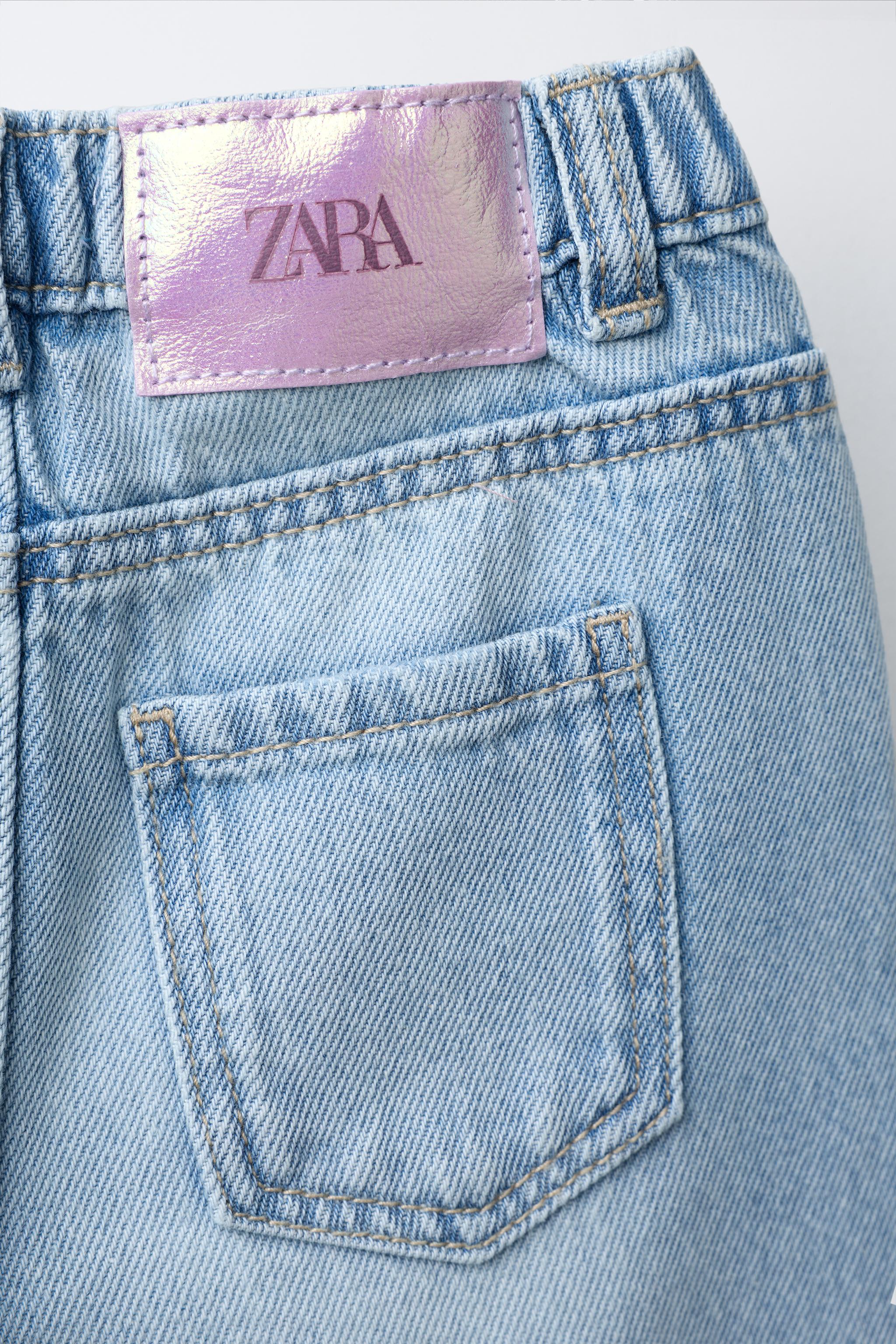 WIDE LEG RIPPED JEANS