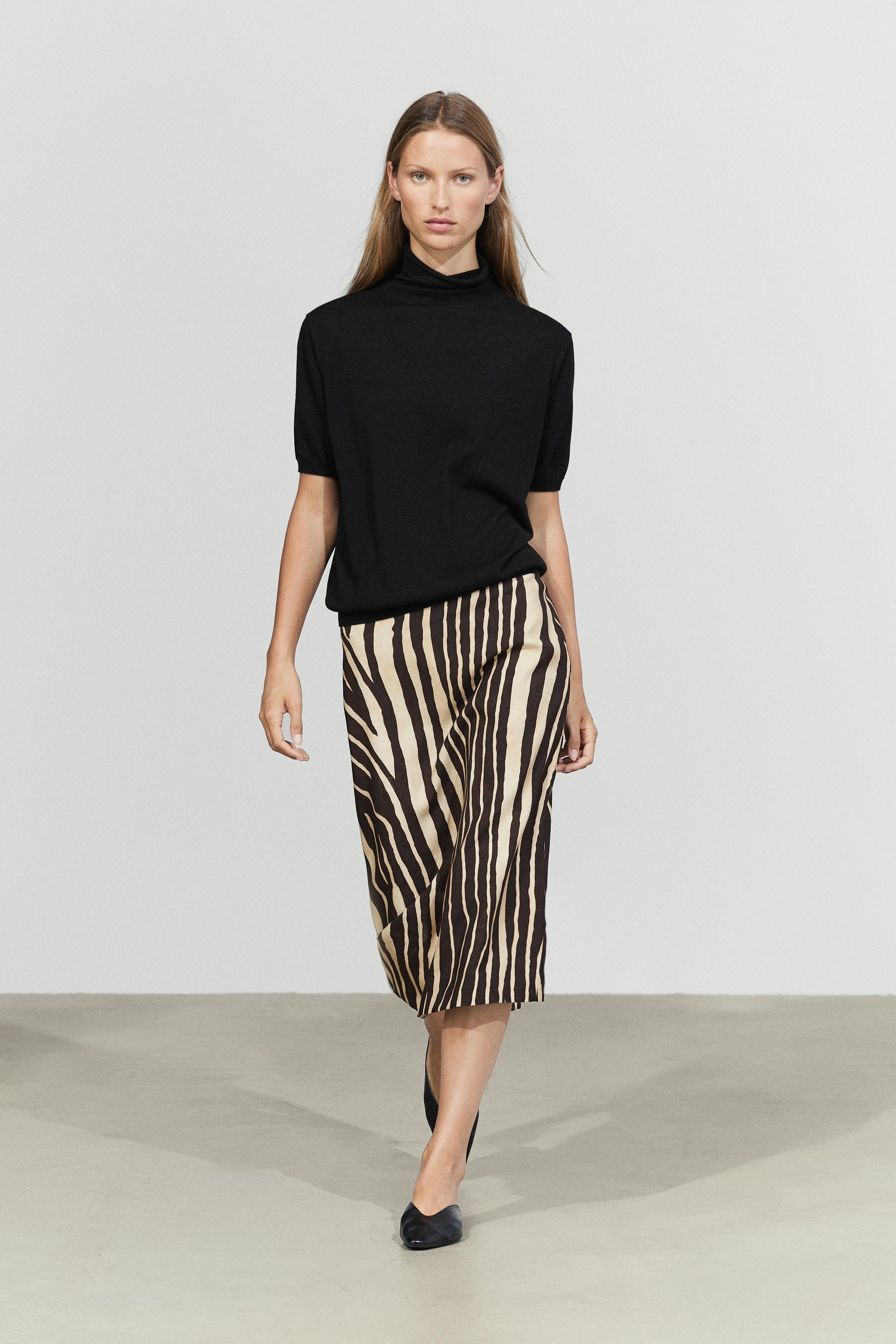 Flowing tube mini skirt — 773