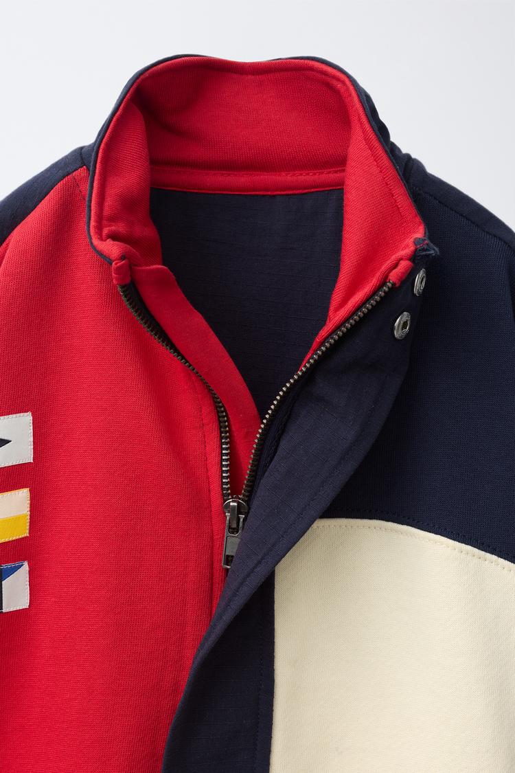 Chaqueta bomber tipo sudadera con parches 3