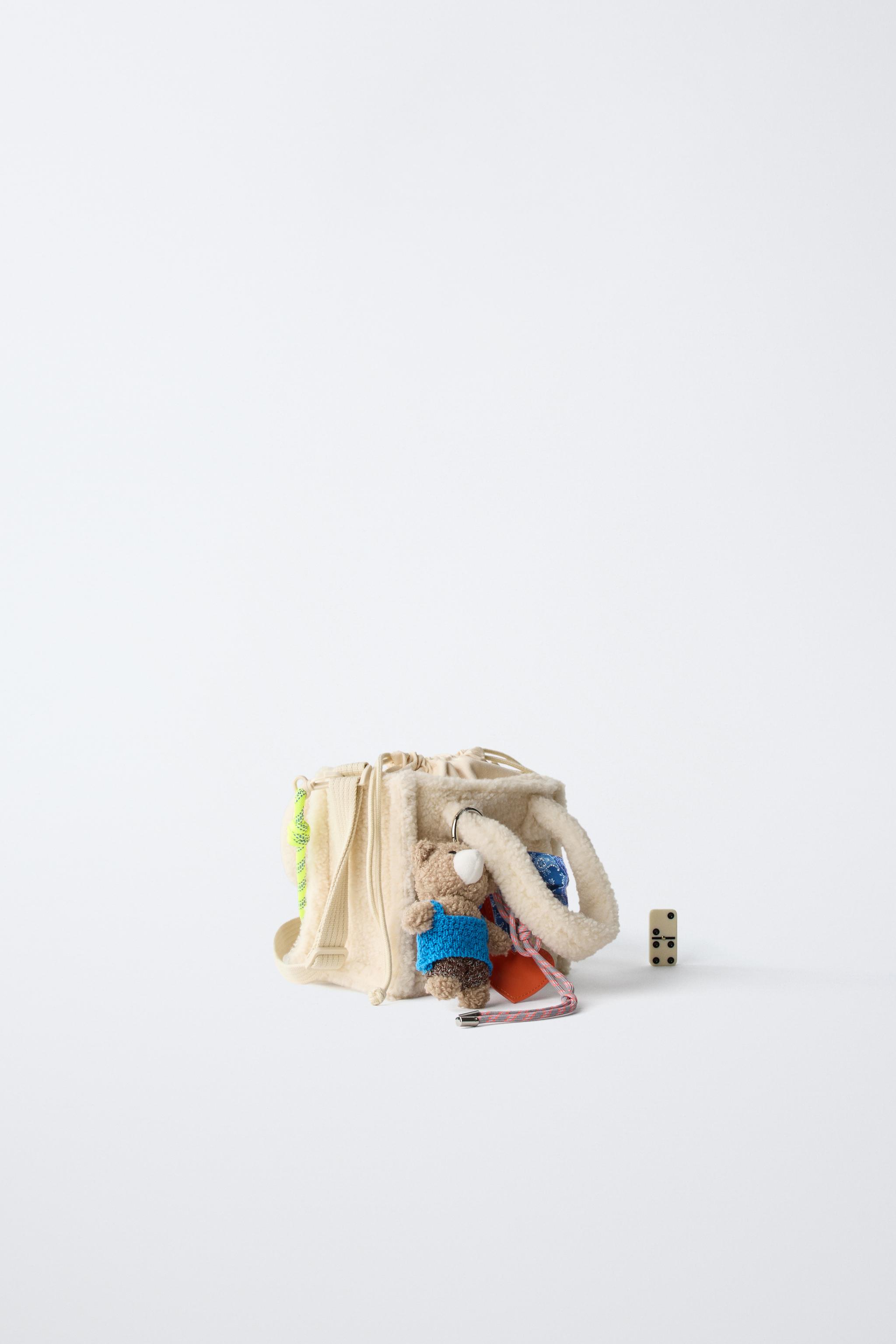 SAC BANDOULIÈRE EN PEAU DE MOUTON CHARM