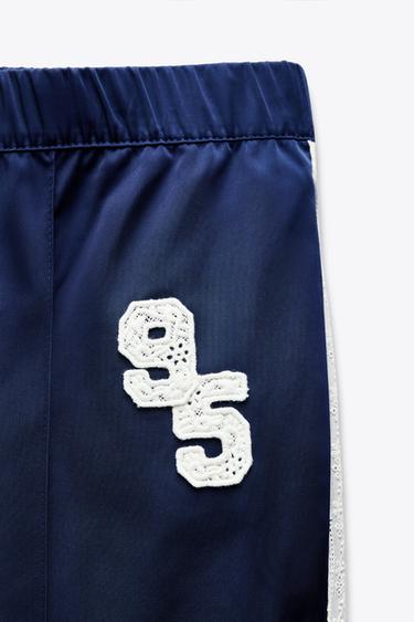 PANTALÓN SATINADO BANDA LATERAL - Marino de Zara