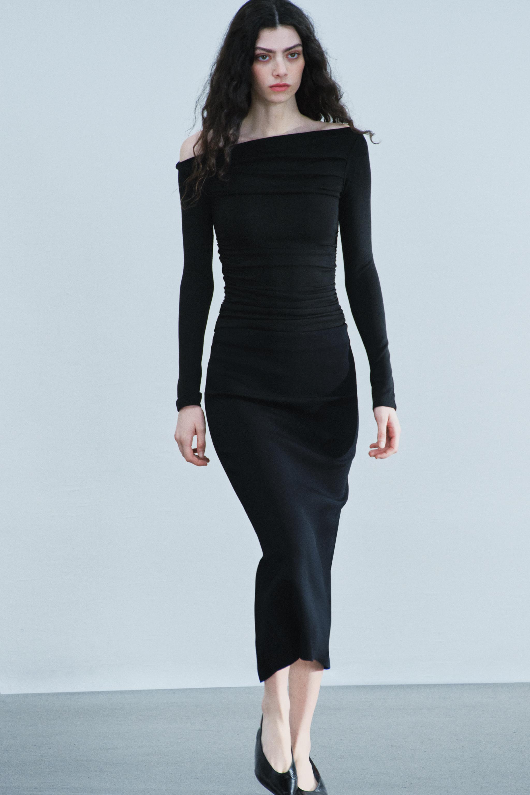 ASYMMETRICAL DRAPED TOP