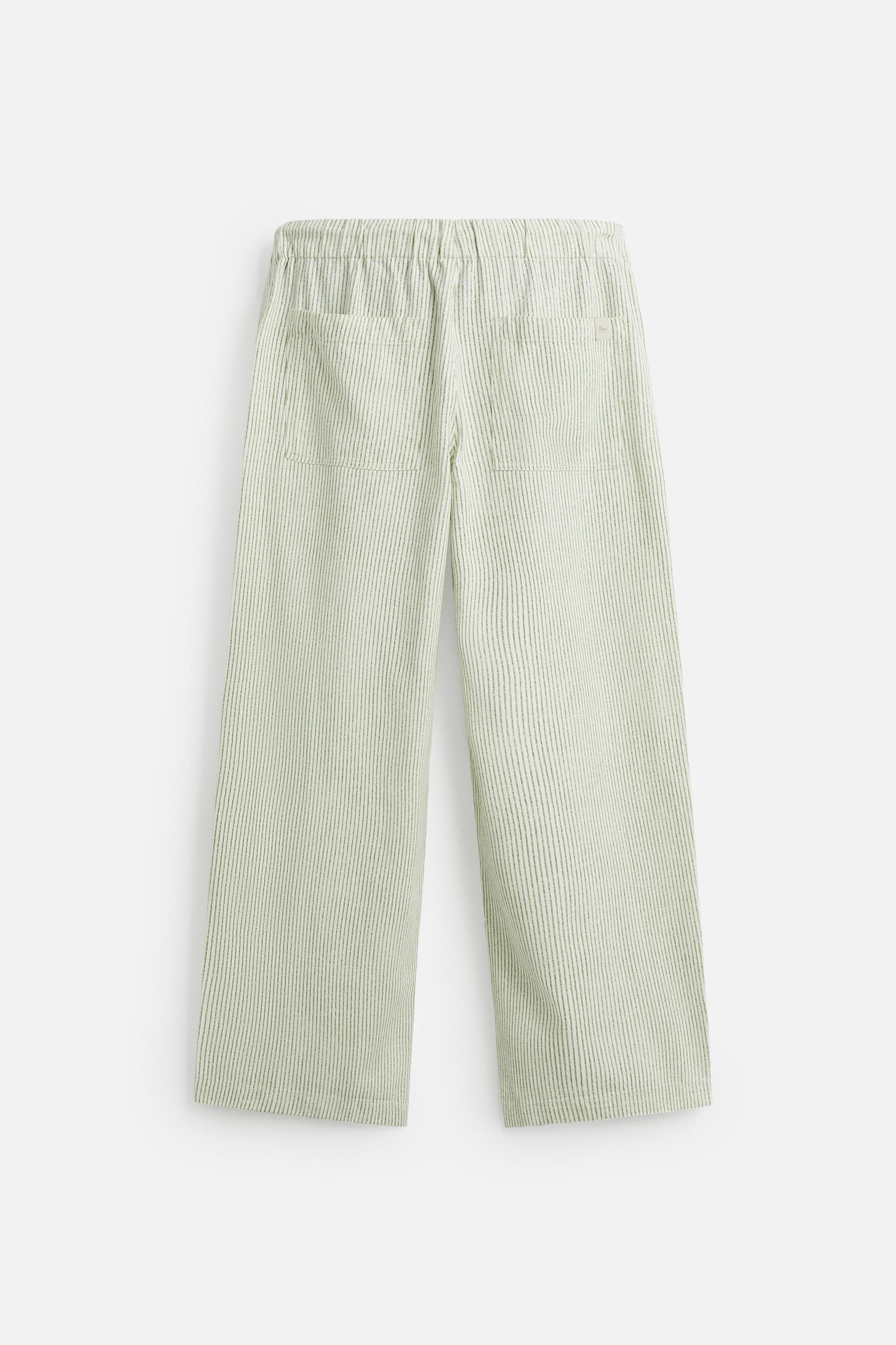STRIPED BAGGY FIT PANTS