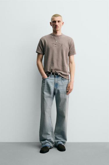 PLETENÉ TRIČKO S NÁŠIVKAMI A VYBLEDNUTÝM EFEKTOM - Klasická šedá zn. Zara