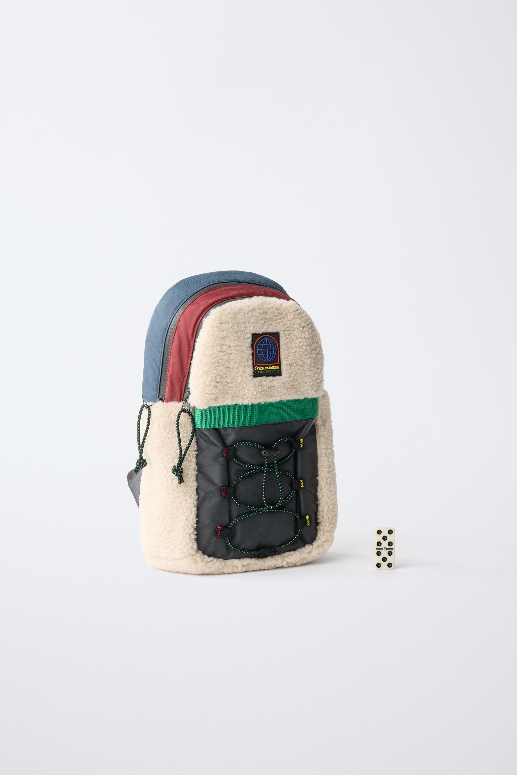 TECHNICAL FAUX SHEARLING CROSSBODY BAG